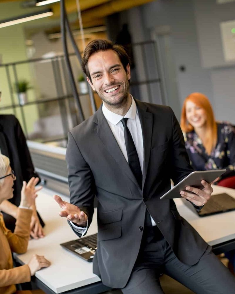 young-businessman-using-digital-tablet-in-office.jpg